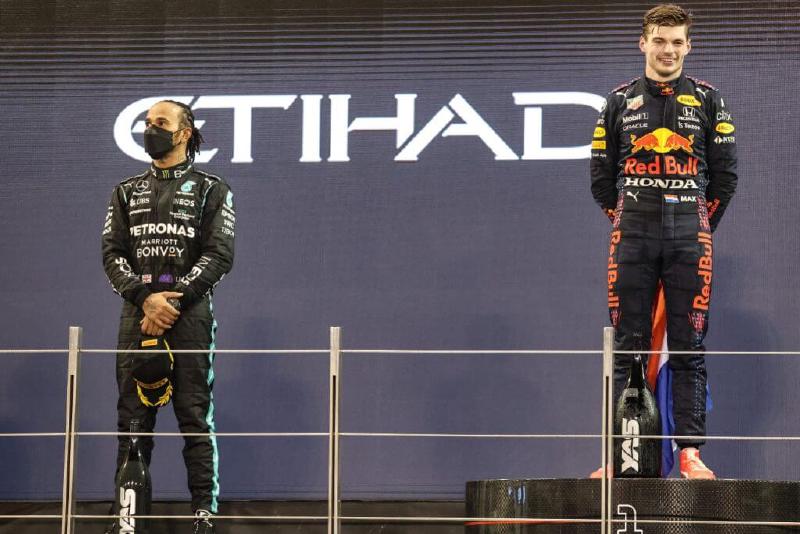 2021 Abu Dhabi GP Podium with Max on the top step and Lewis on P2 step